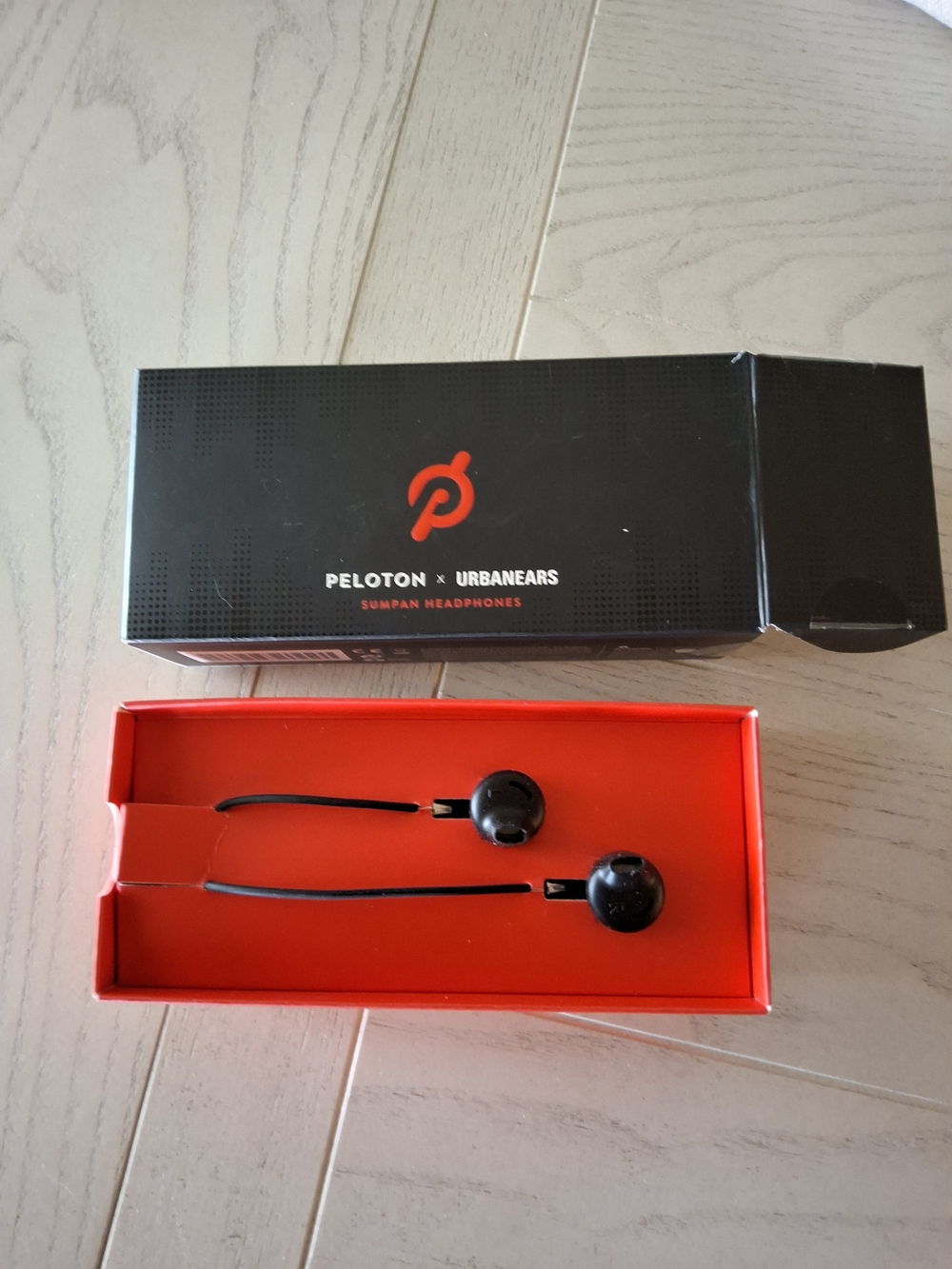 Peloton Black Earbuds with Red Box